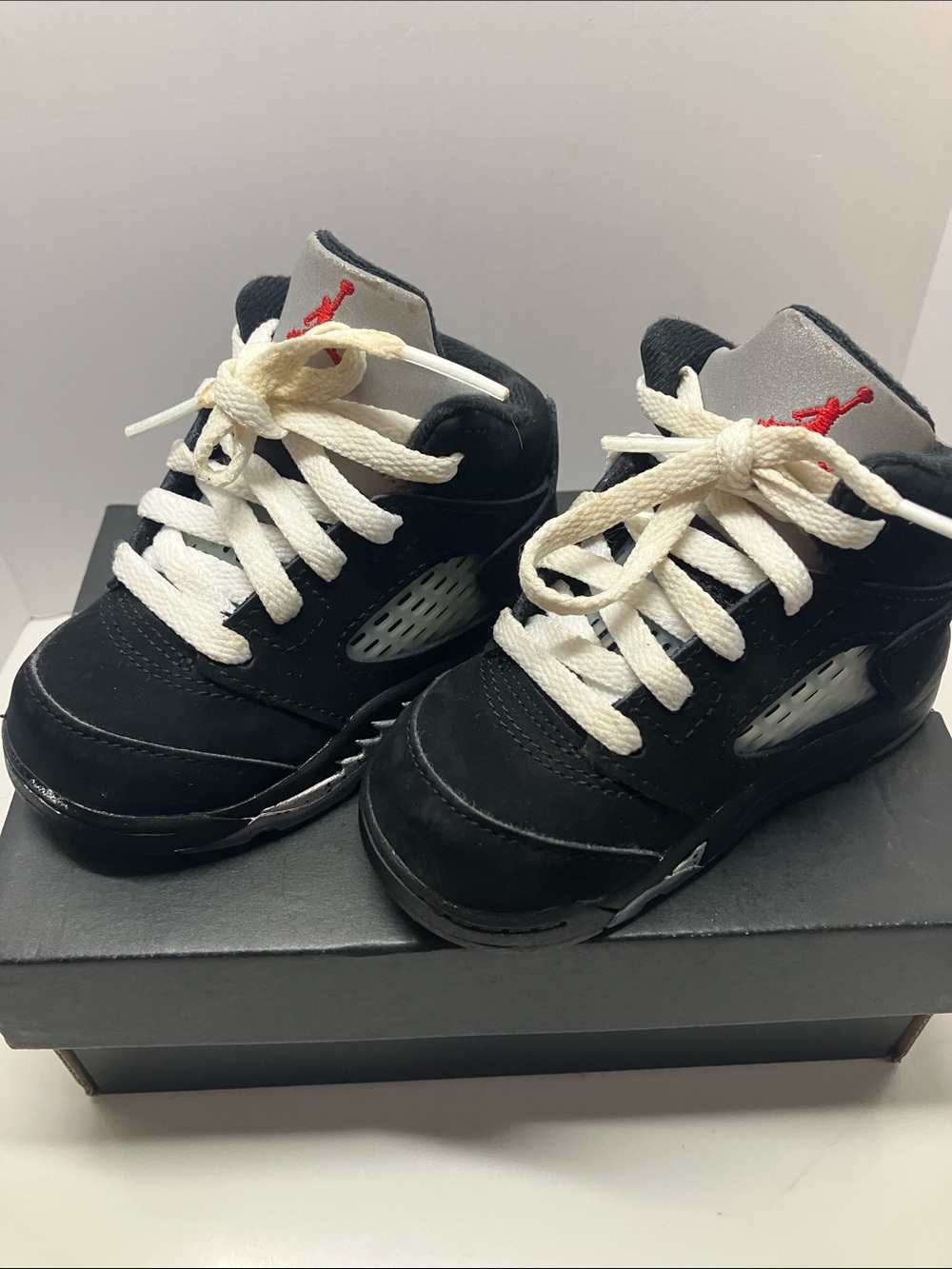 Jordan Kids Black and White Sneakers with Red Logo